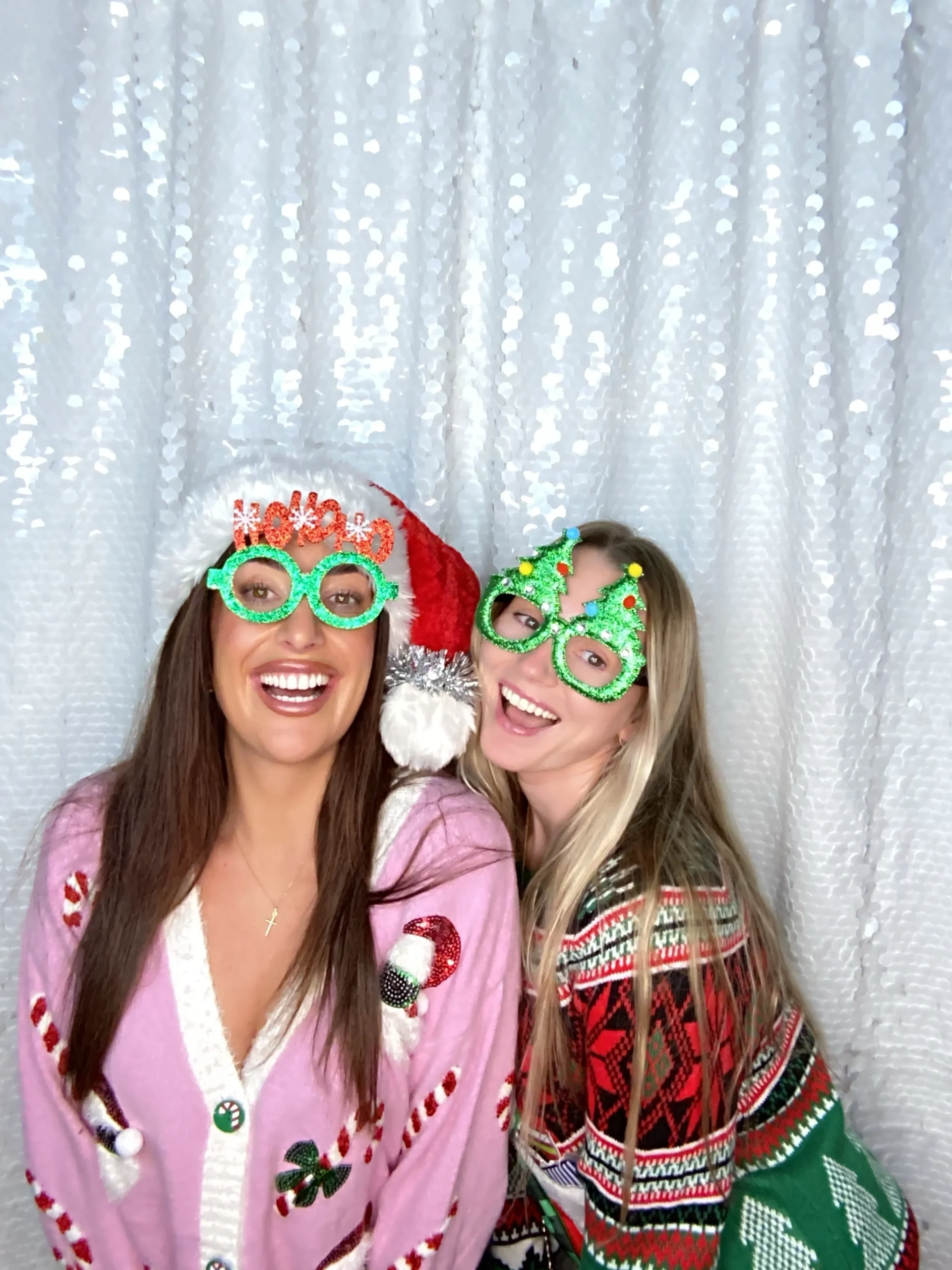 Guests enjoying festive holiday photo booth experience